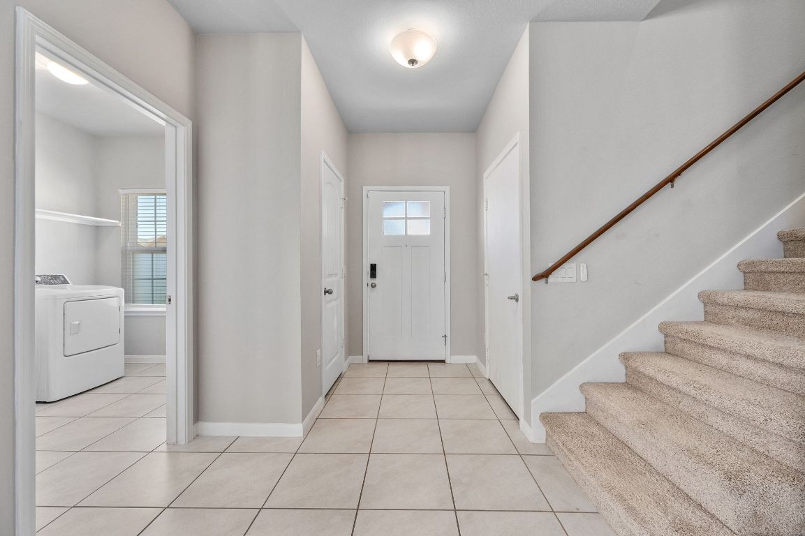 6701 Janes Ranch Road Austin, TX 78744 - Photo 17 of 36 a view of a hallway with bathroom and a bathroom