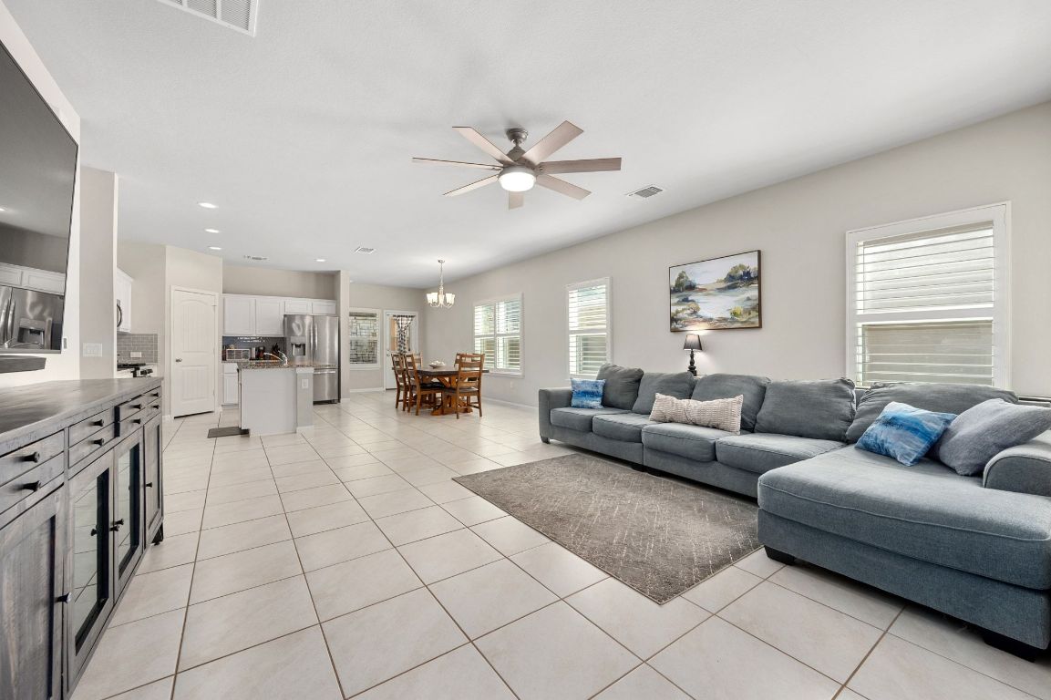 6701 Janes Ranch Road Austin, TX 78744 - Photo 2 of 36 a living room with furniture and kitchen view