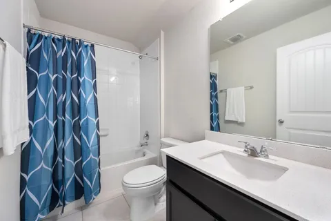 a bathroom with a sink and a toilet