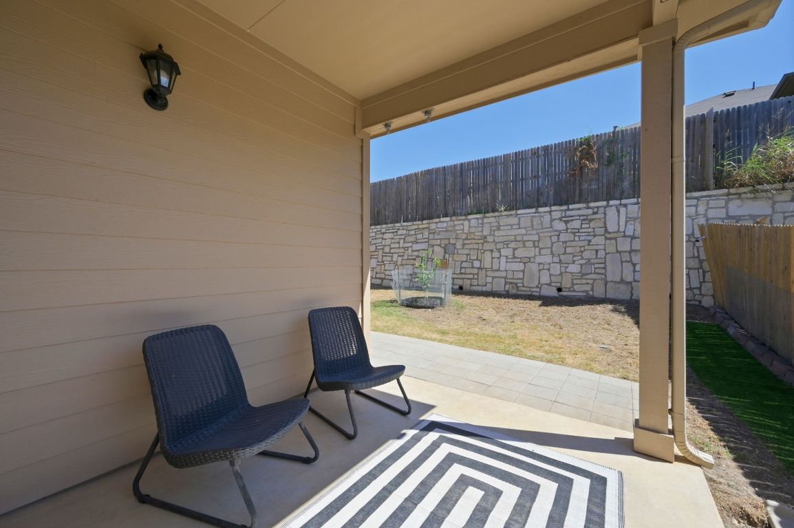 6701 Janes Ranch Road Austin, TX 78744 - Photo 24 of 36 a view of a chair and table in the balcony