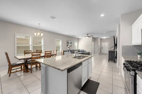a kitchen with a counter space and a sink