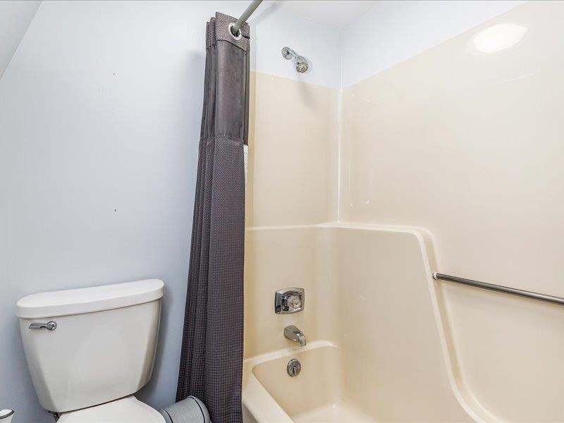 22 Thatcher Lane Galena, IL 61036 - Photo 19 of 24 a bathroom with a toilet and shower