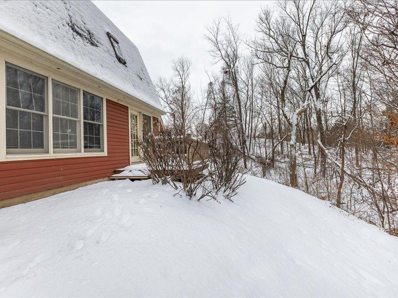 22 Thatcher Lane Galena, IL 61036 - Photo 22 of 24 a view of house with yard and sitting area