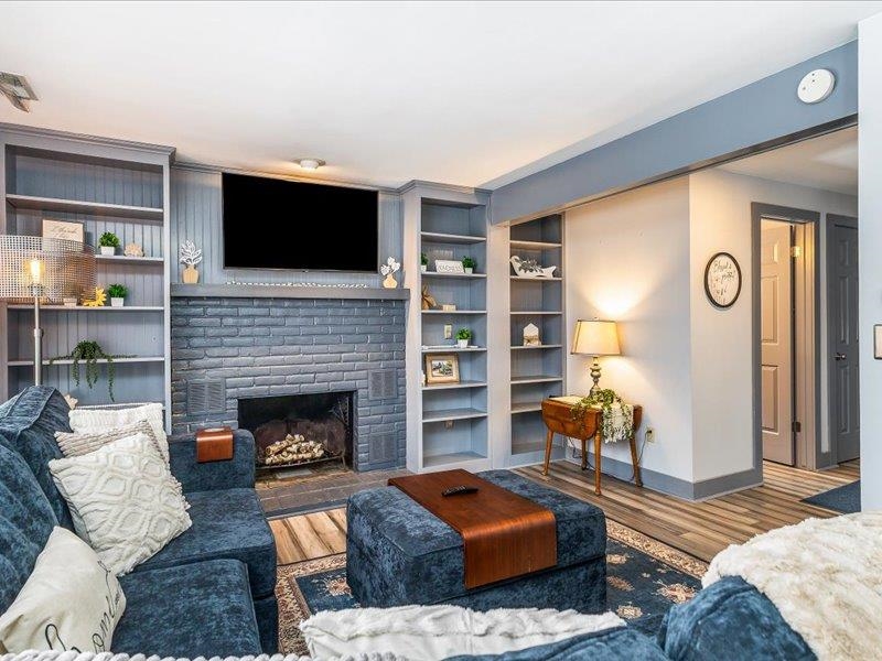 22 Thatcher Lane Galena, IL 61036 - Photo 5 of 24 a living room with furniture fireplace and flat screen tv