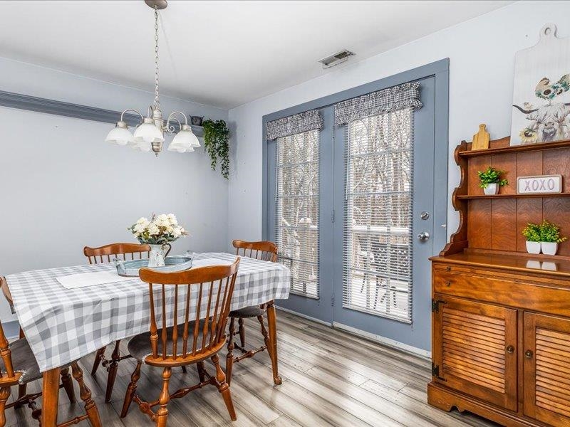22 Thatcher Lane Galena, IL 61036 - Photo 7 of 24 a table and chairs in a room