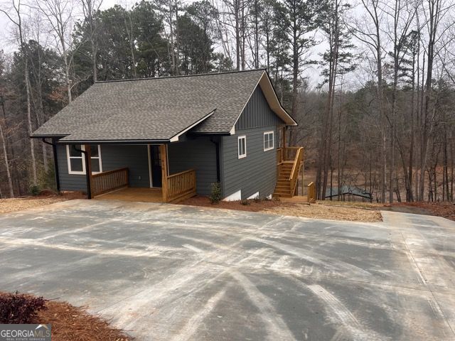 410 Lakeside Hills Road Martin, GA 30557 - Photo 14 of 53 a view of a house with a entertaining space