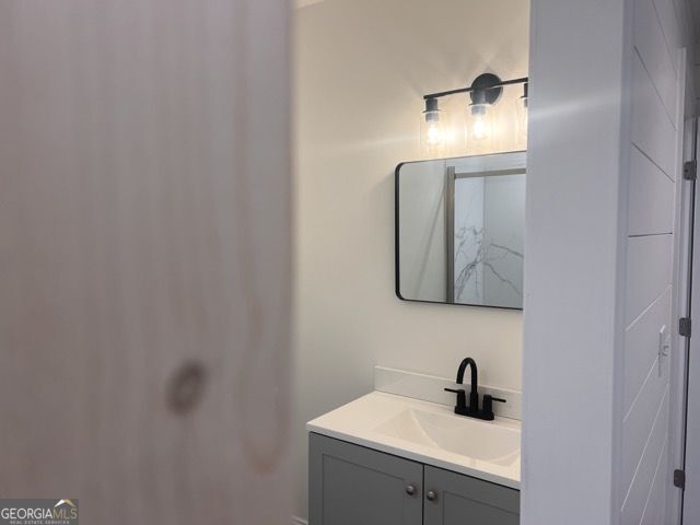 410 Lakeside Hills Road Martin, GA 30557 - Photo 29 of 53 a bathroom with a sink and a mirror