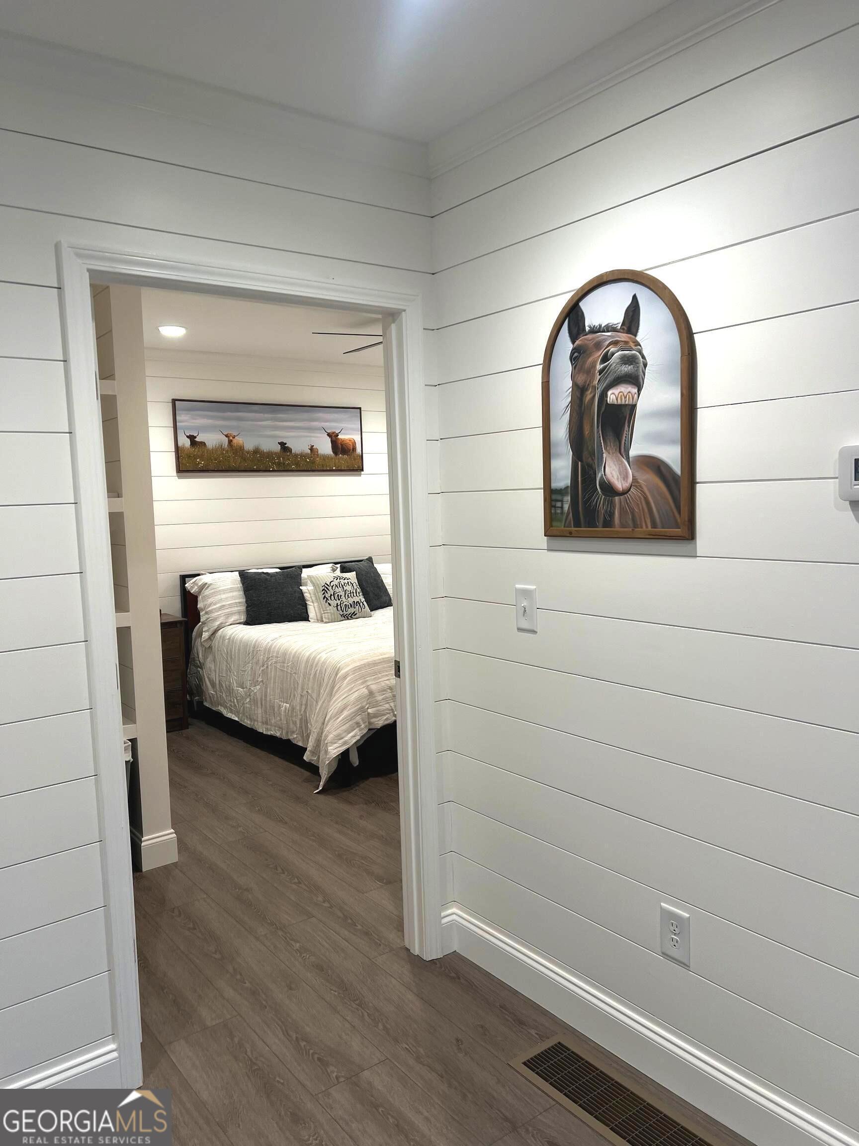 410 Lakeside Hills Road Martin, GA 30557 - Photo 34 of 71 a bedroom with a bed and a mirror