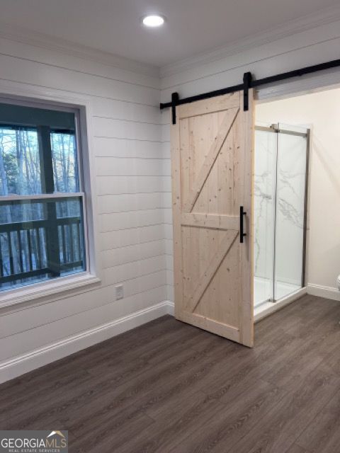 410 Lakeside Hills Road Martin, GA 30557 - Photo 38 of 71 a view of an empty room with wooden floor and a window
