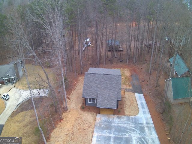 410 Lakeside Hills Road Martin, GA 30557 - Photo 40 of 53 a bathroom with a sink and a mirror