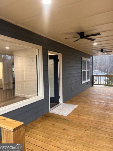 410 Lakeside Hills Road Martin, GA 30557 - Photo 43 of 53 a view of a livingroom with wooden floor and a yard