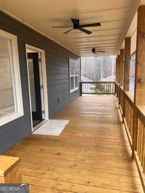 410 Lakeside Hills Road Martin, GA 30557 - Photo 44 of 71 a view of an empty room with wooden floor