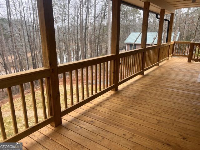 410 Lakeside Hills Road Martin, GA 30557 - Photo 46 of 71 a view of a balcony with wooden floor