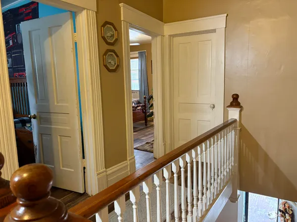 a white toilet sitting next to a bathroom sink