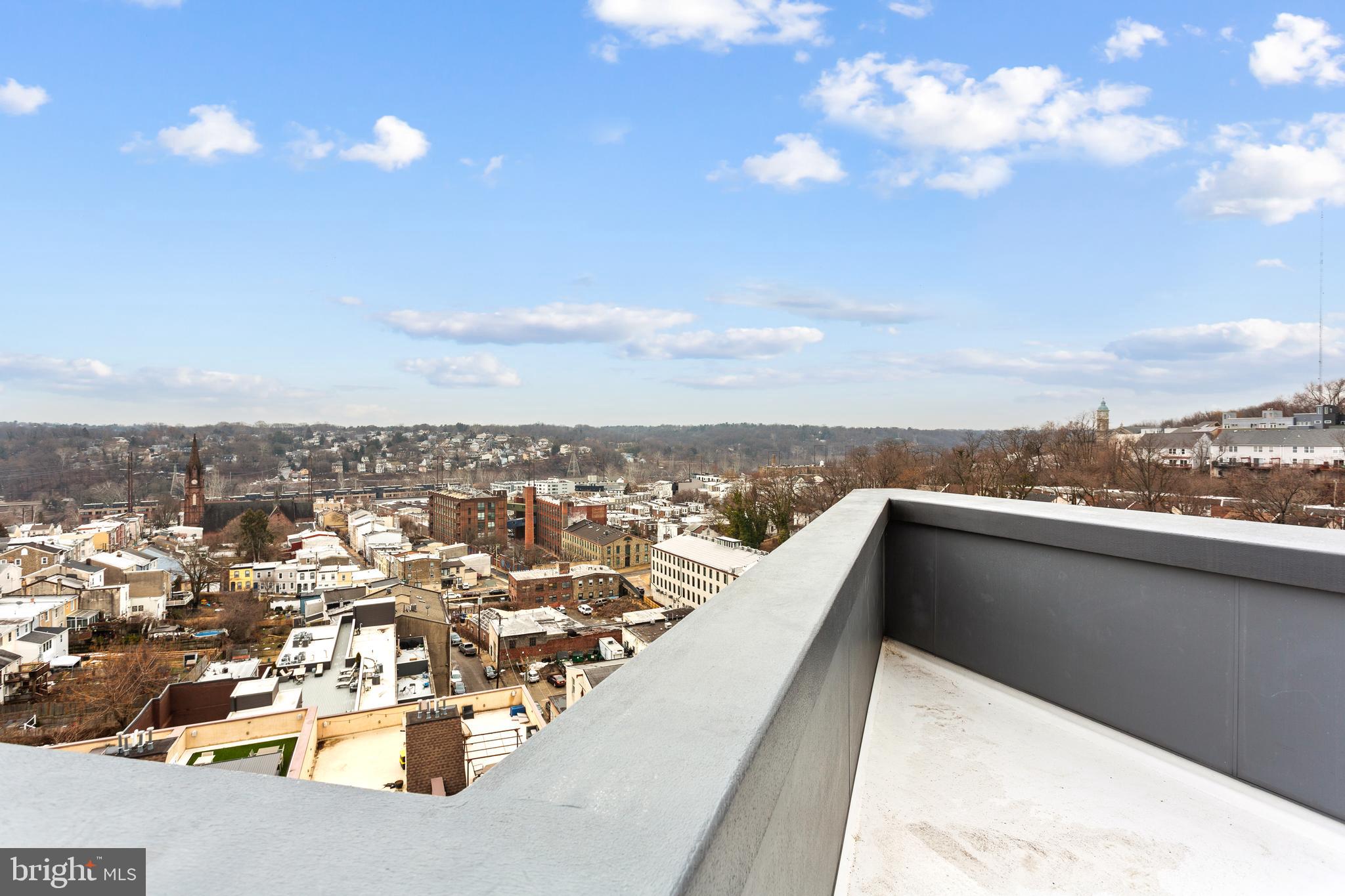 239 Krams Avenue Philadelphia, PA 19128 - Photo 26 of 54 Roof Deck view towards downtown Manayunk