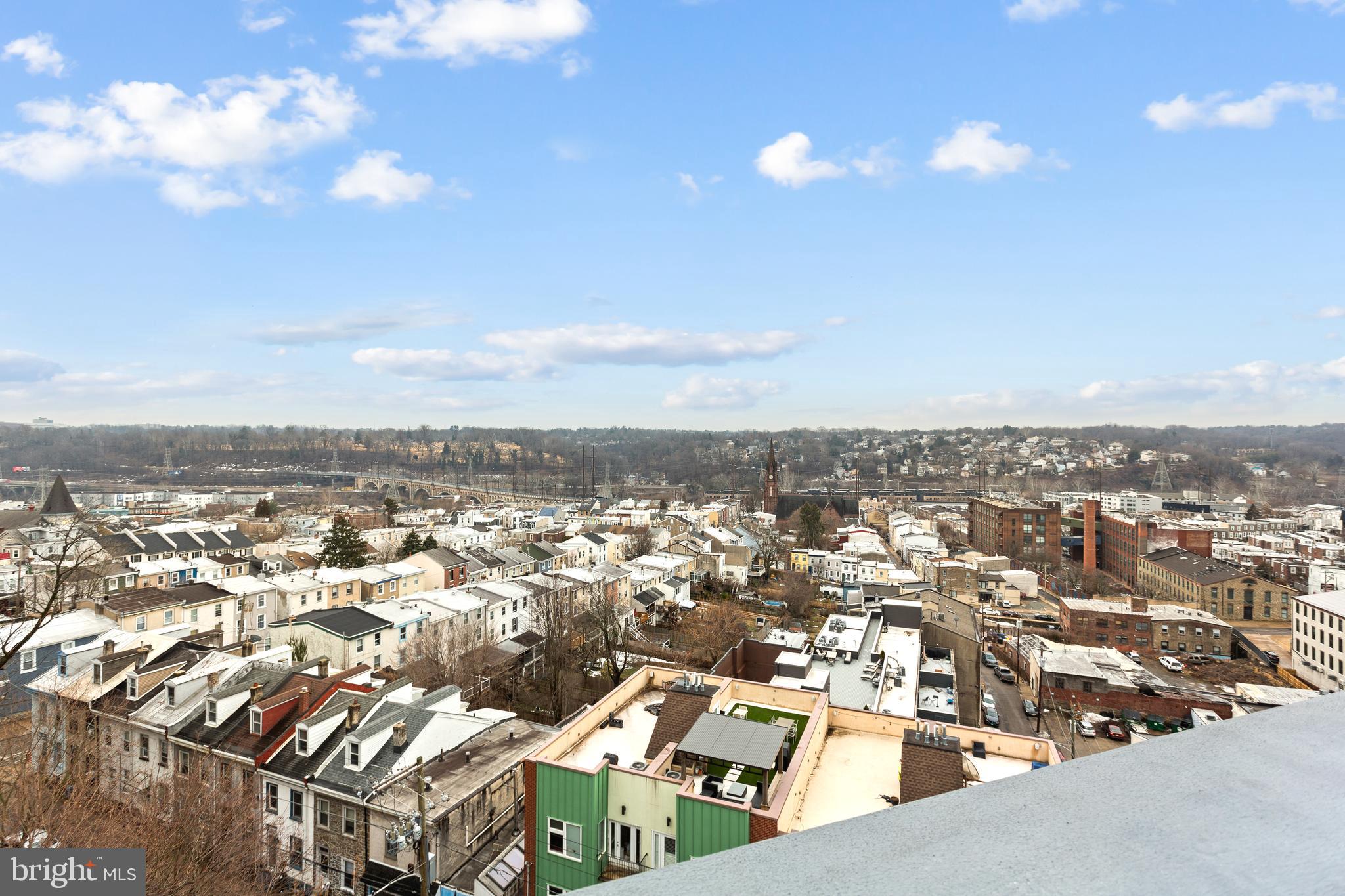 239 Krams Avenue Philadelphia, PA 19128 - Photo 27 of 54 Roof Deck view towards downtown Manayunk