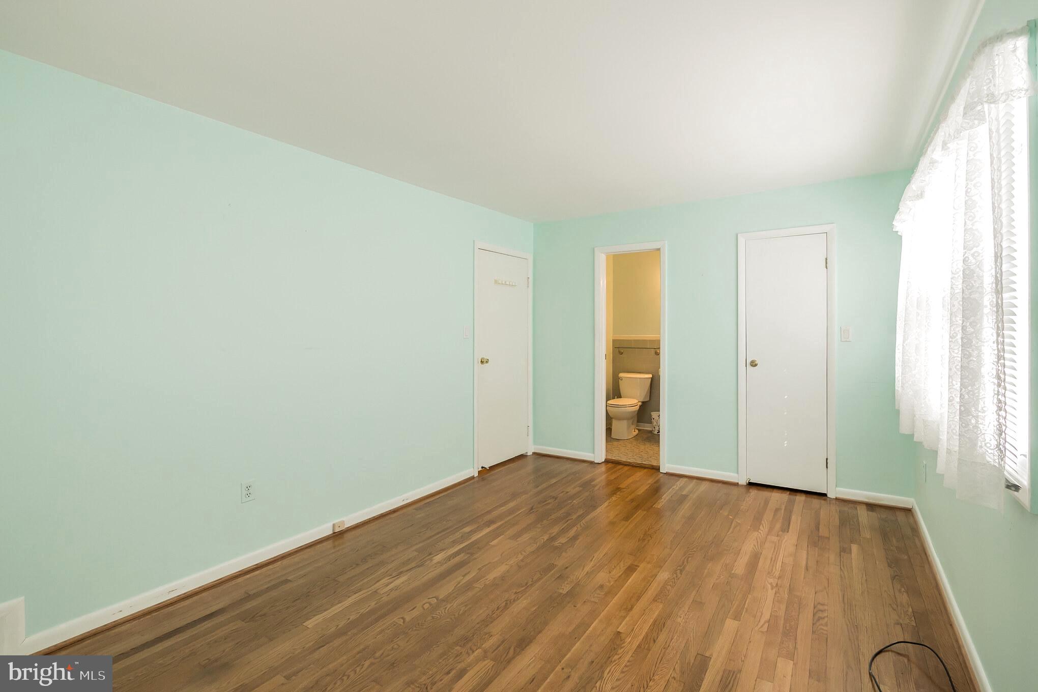 4201 Elby Street Silver Spring, MD 20906 - Photo 12 of 30 Master Bedroom with Private Bath & Walk-In Closet