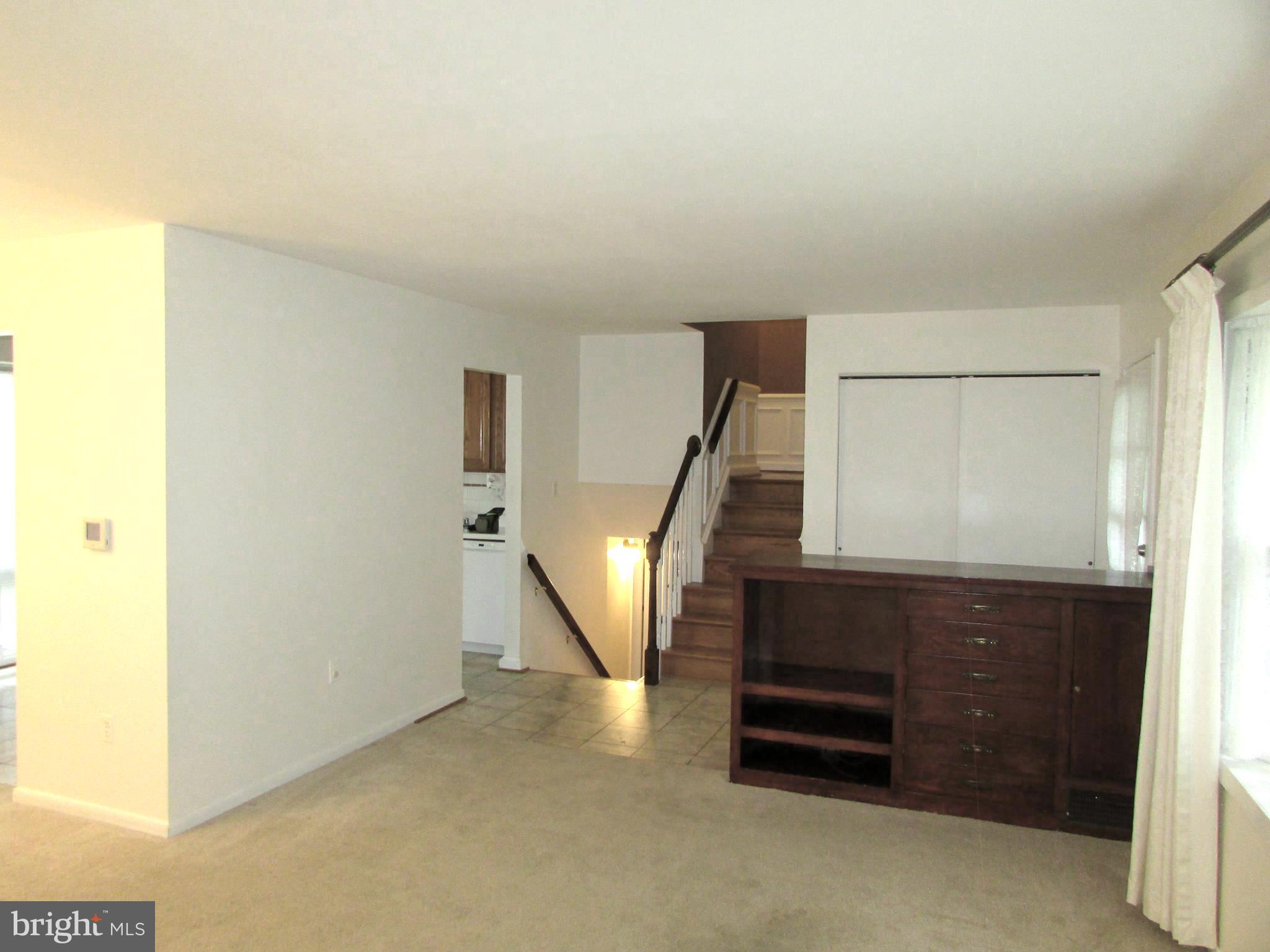 4201 Elby Street Silver Spring, MD 20906 - Photo 5 of 30 Living Rm & Dining Ell-Note: hardwod under carpet