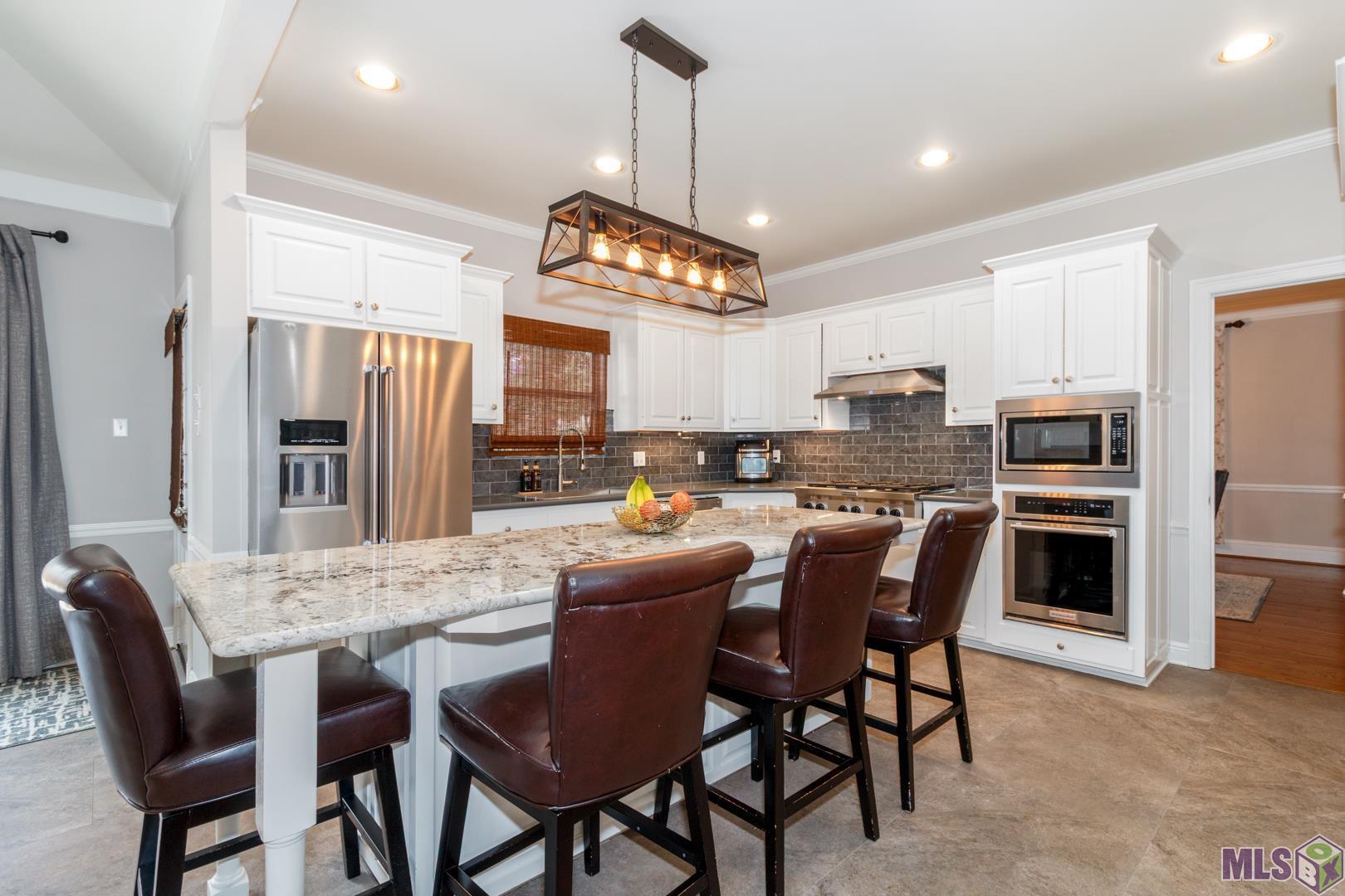 531 Woodgate Boulevard Baton Rouge, LA 70808 - Photo 9 of 32 Gorgeous stone countertops