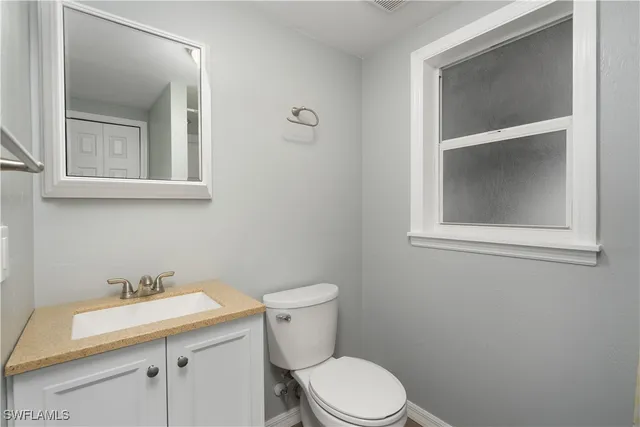 a bathroom with a sink and a toilet