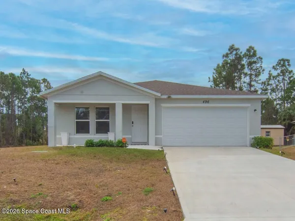front view of a house with a garage