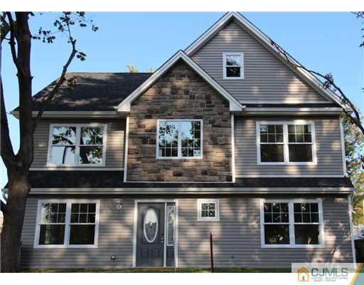 60 Sturgis Road Edison, NJ 08817 - Photo 1 of 5 a front view of a house with glass windows