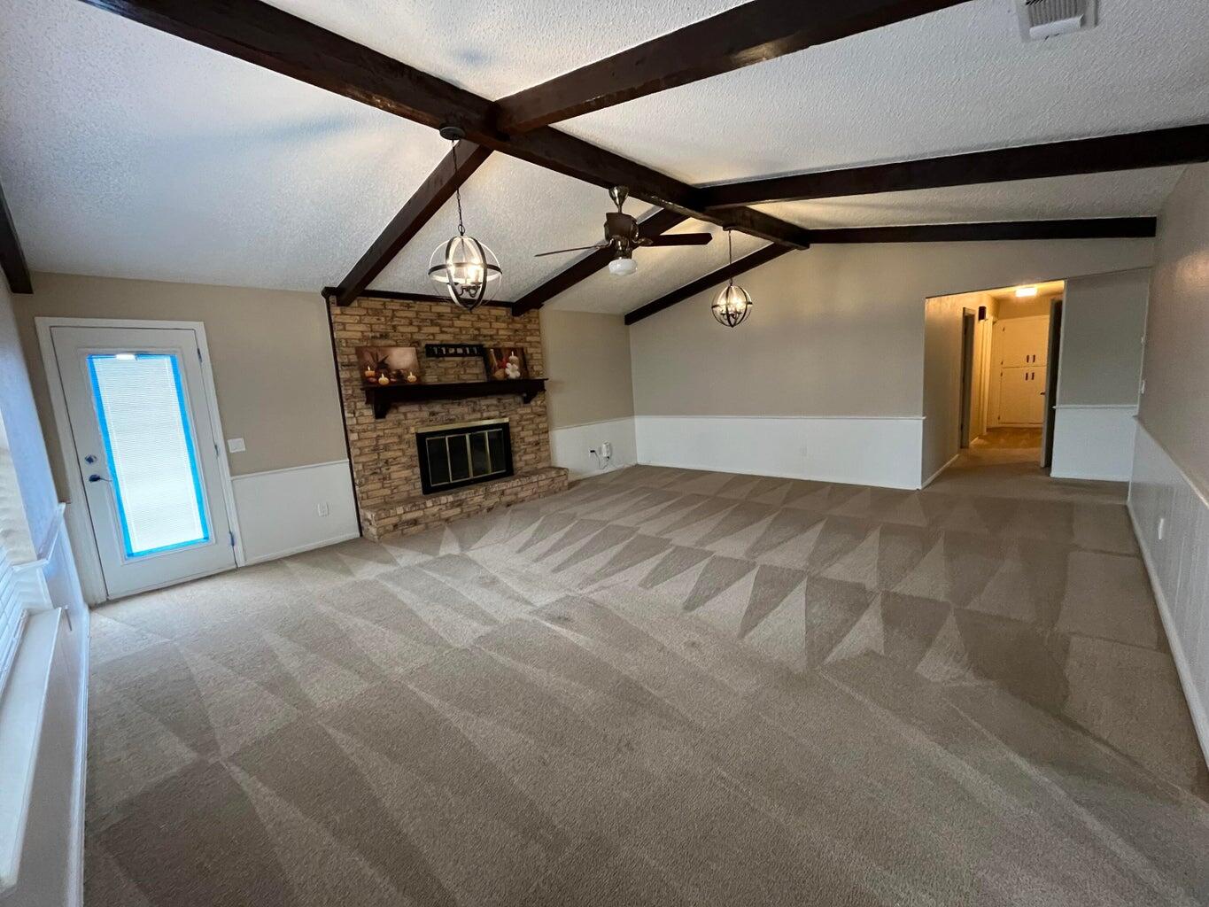 1312 Yonkers Street Plainview, TX 79072 - Photo 5 of 25 a view of a hallway with wooden floor