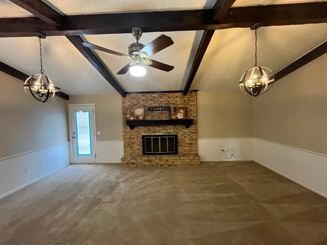 a view of a livingroom with a fireplace
