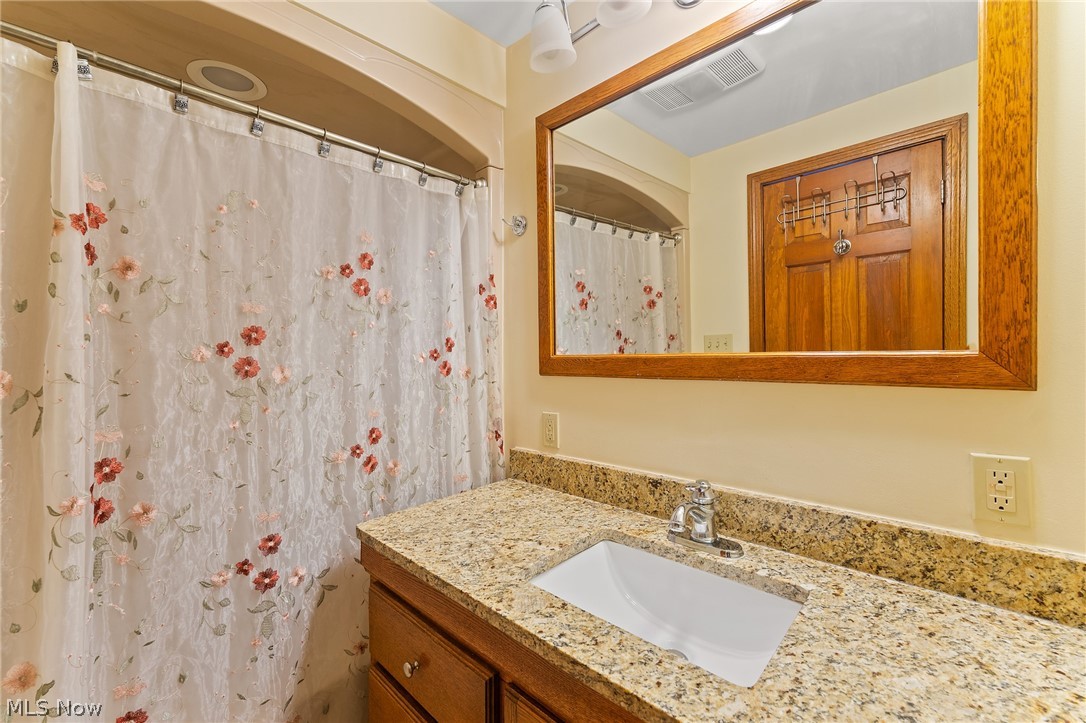 1815 Wick Campbell Road Hubbard, OH 44425 - Photo 32 of 43 Bathroom featuring vanity with extensive cabinet space