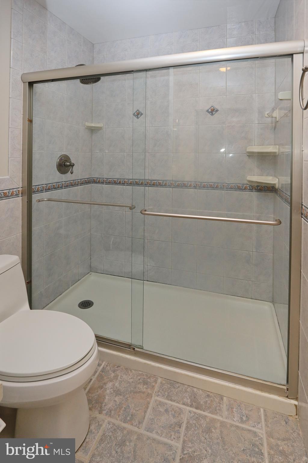 11633 Hunters Green Court Reston, VA 20191 - Photo 23 of 53 Full wall ceramic tiled shower