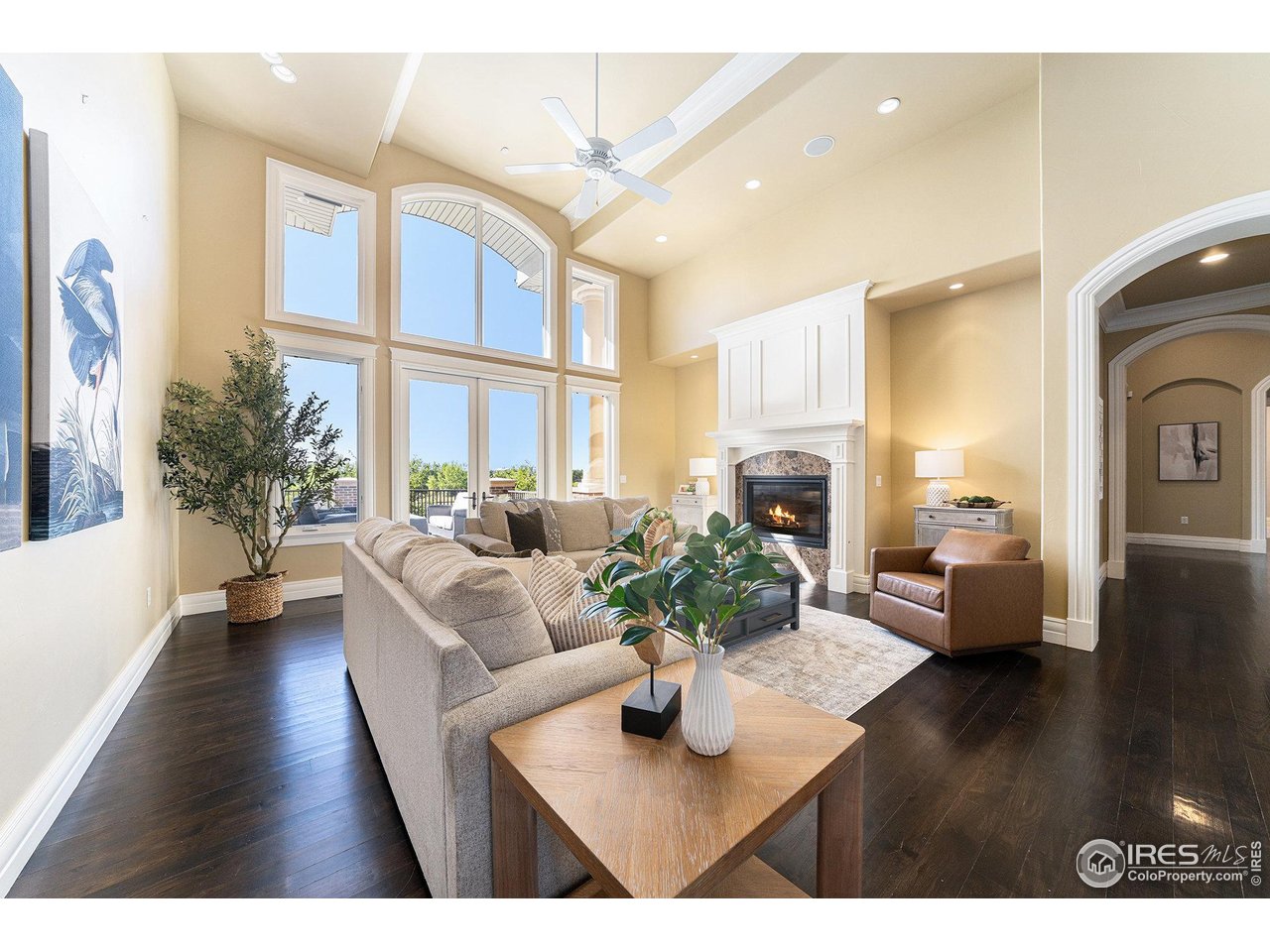 6344 Rookery Road Fort Collins, CO 80528 - Photo 11 of 40 a living room with furniture fireplace and a large window