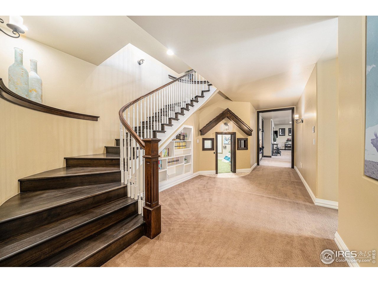 6344 Rookery Road Fort Collins, CO 80528 - Photo 29 of 40 a view of entryway and hall with wooden floor