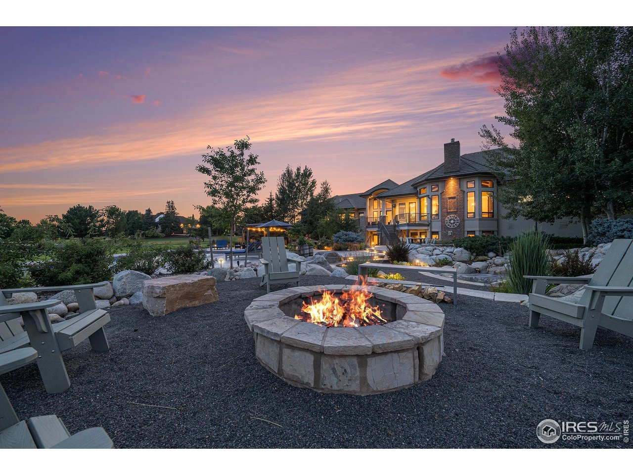 6344 Rookery Road Fort Collins, CO 80528 - Photo 8 of 40 a view of a swimming pool with a patio