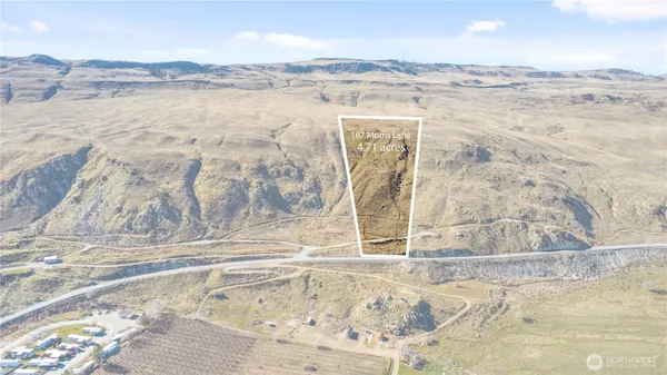 a view of a bathroom with a lake view