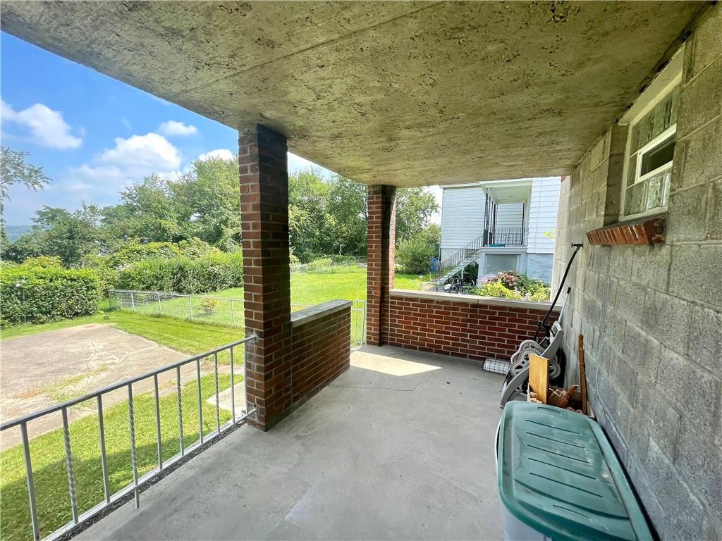820 Etna Street McKees Rocks, PA 15136 - Photo 14 of 16 a view of a porch with furniture and garden