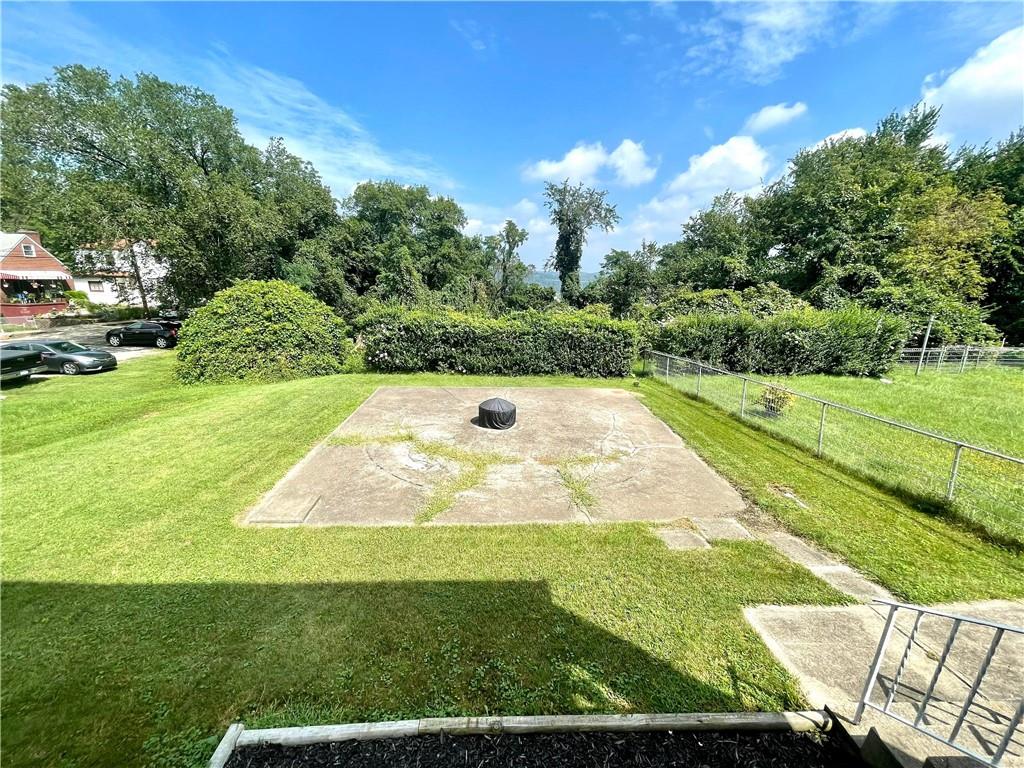 820 Etna Street McKees Rocks, PA 15136 - Photo 15 of 16 a view of a swimming pool with a yard