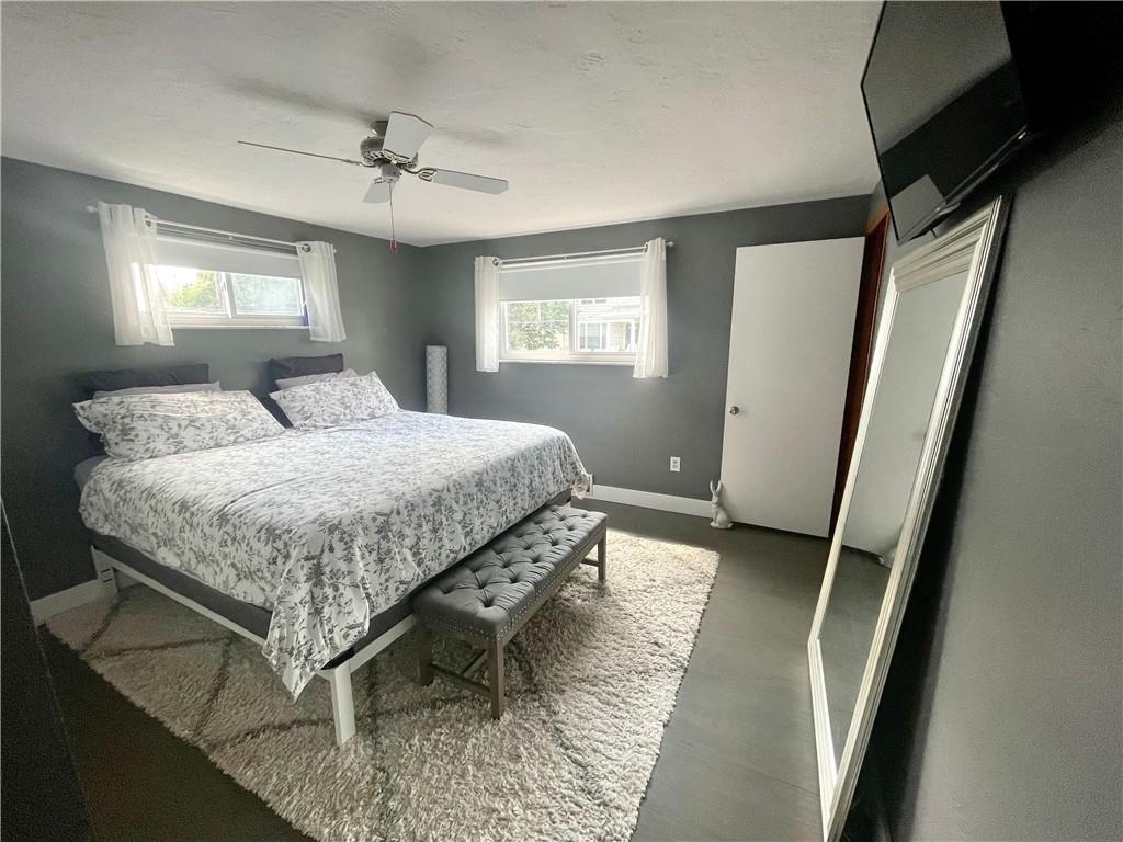 820 Etna Street McKees Rocks, PA 15136 - Photo 8 of 16 a bedroom with a bed and window