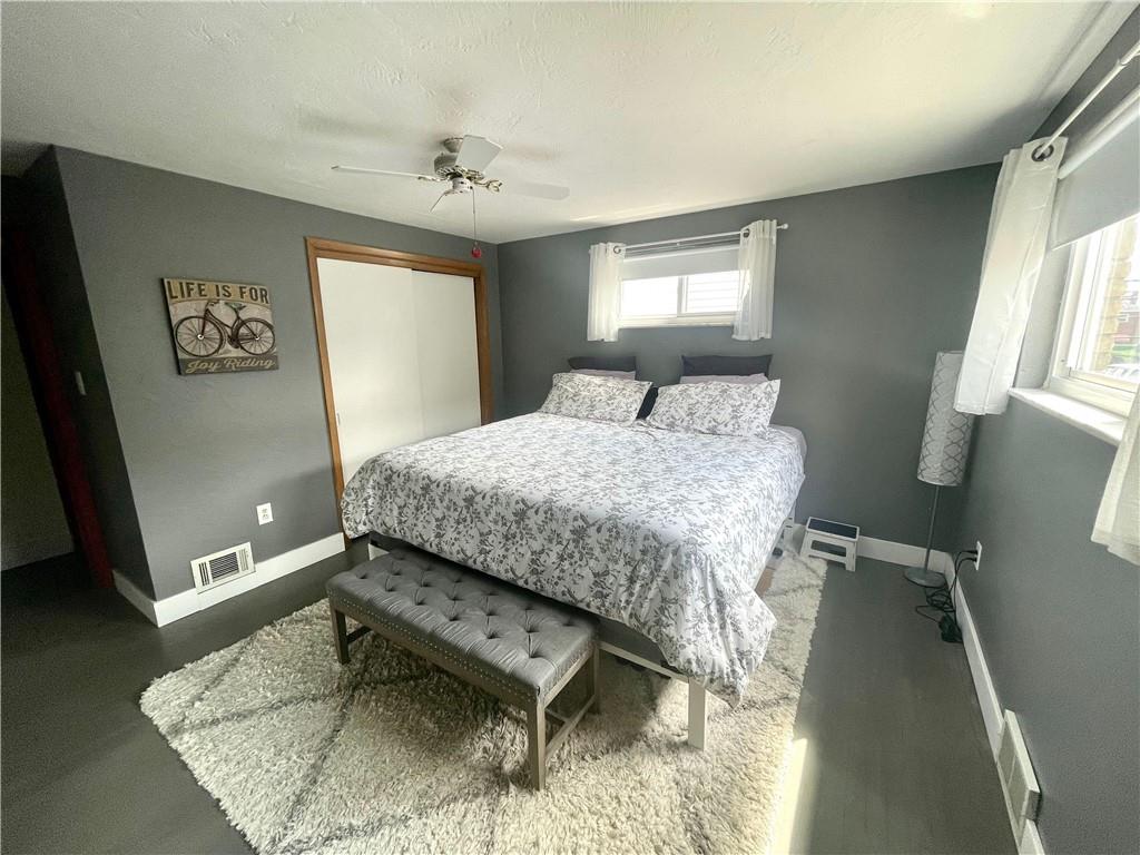 820 Etna Street McKees Rocks, PA 15136 - Photo 9 of 16 a bedroom with a bed and window