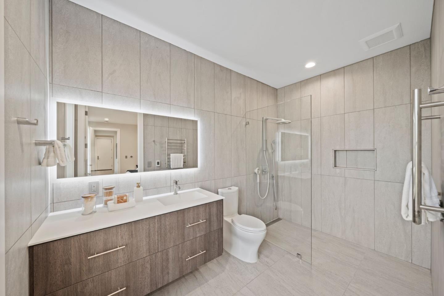 2698 Greenrock Road Milpitas, CA 95035 - Photo 53 of 99 a bathroom with double vanity sink a mirror and a shower