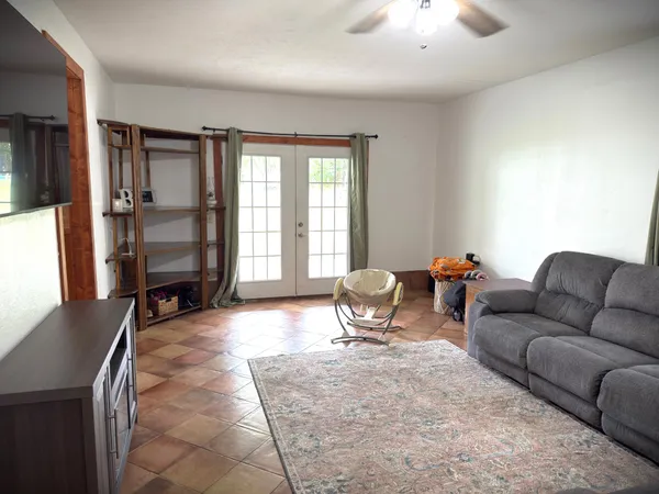 a living room with furniture and a table