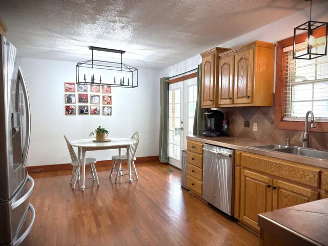 a view of a vase of flowers sitting on a table