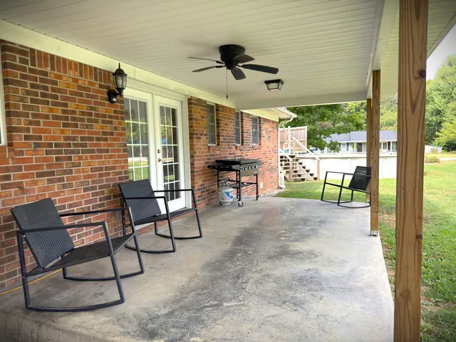 a view of a porch and garden
