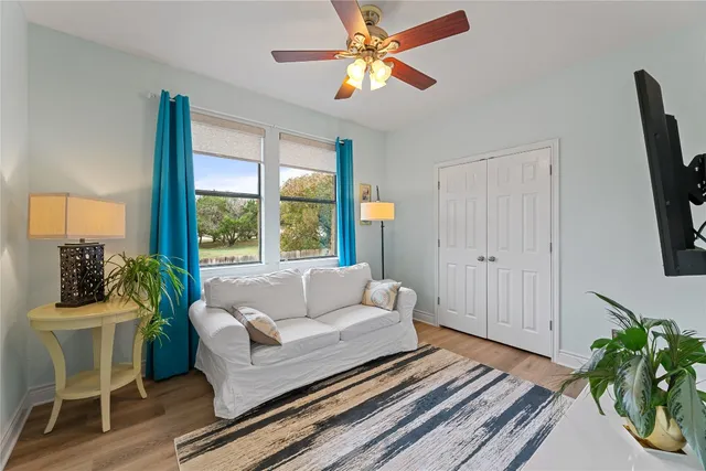 a living room with furniture and a window
