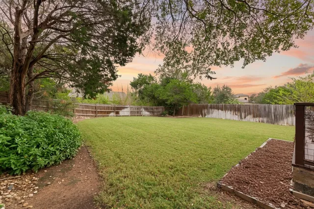 a view of a house with pool table and chairs