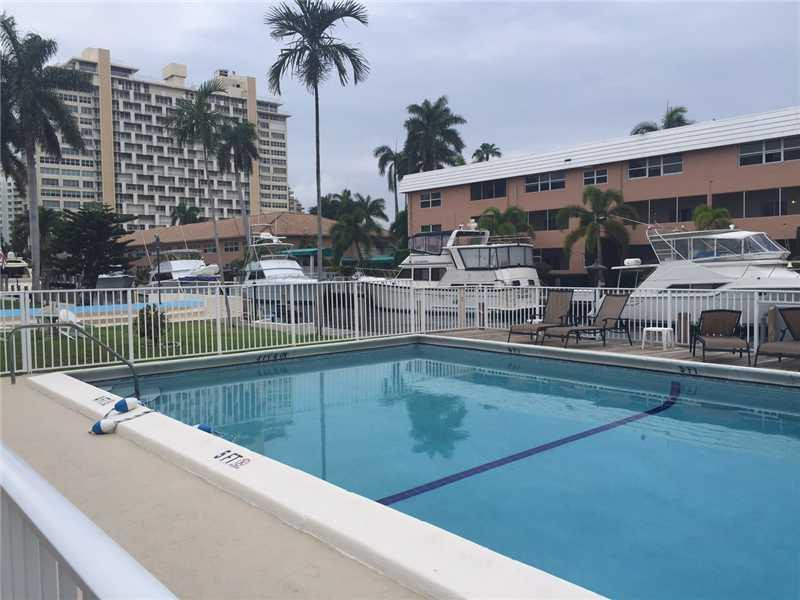 901 North Birch Road, Unit 5B Fort Lauderdale, FL 33304 - Photo 12 of 12 a view of a swimming pool with a patio