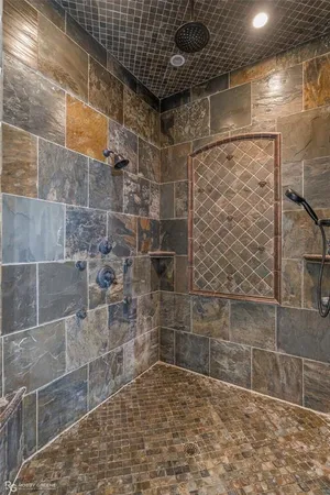 a kitchen with granite countertop a sink and a stove