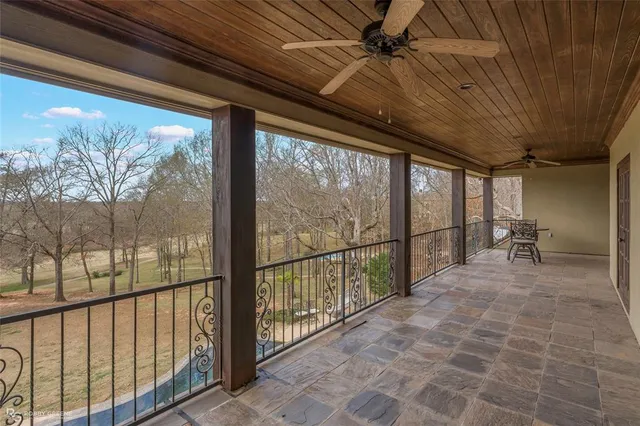 a utility room with cabinets dryer and washer