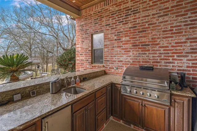 a outdoor space with patio furniture and windows