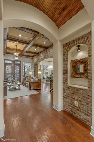 a view of a livingroom with furniture and windows