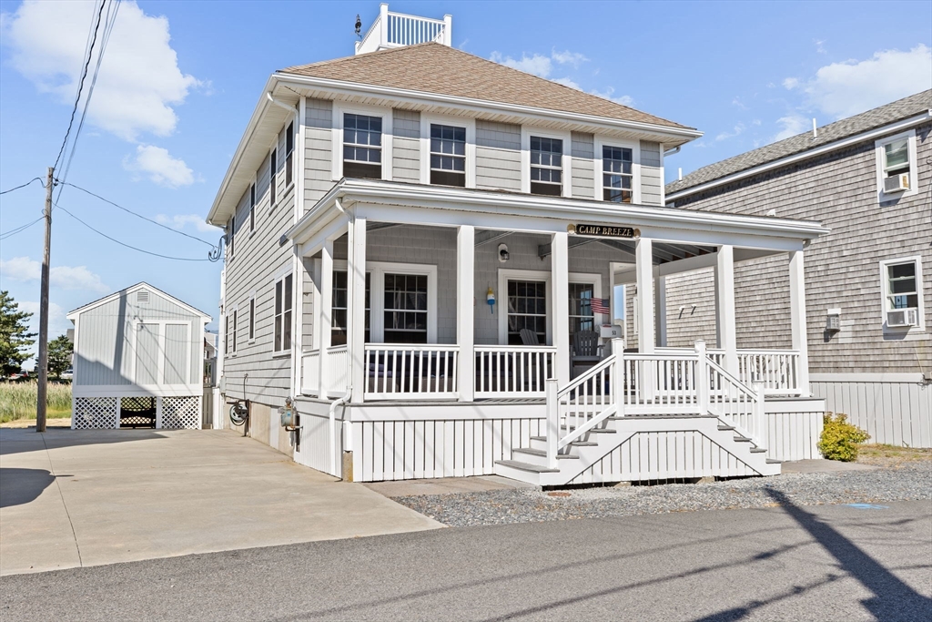 a front view of a house with a porch